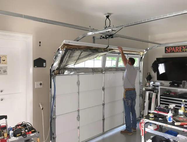 Garage door section replacement by Paramount Garage Door Repair in Paramount